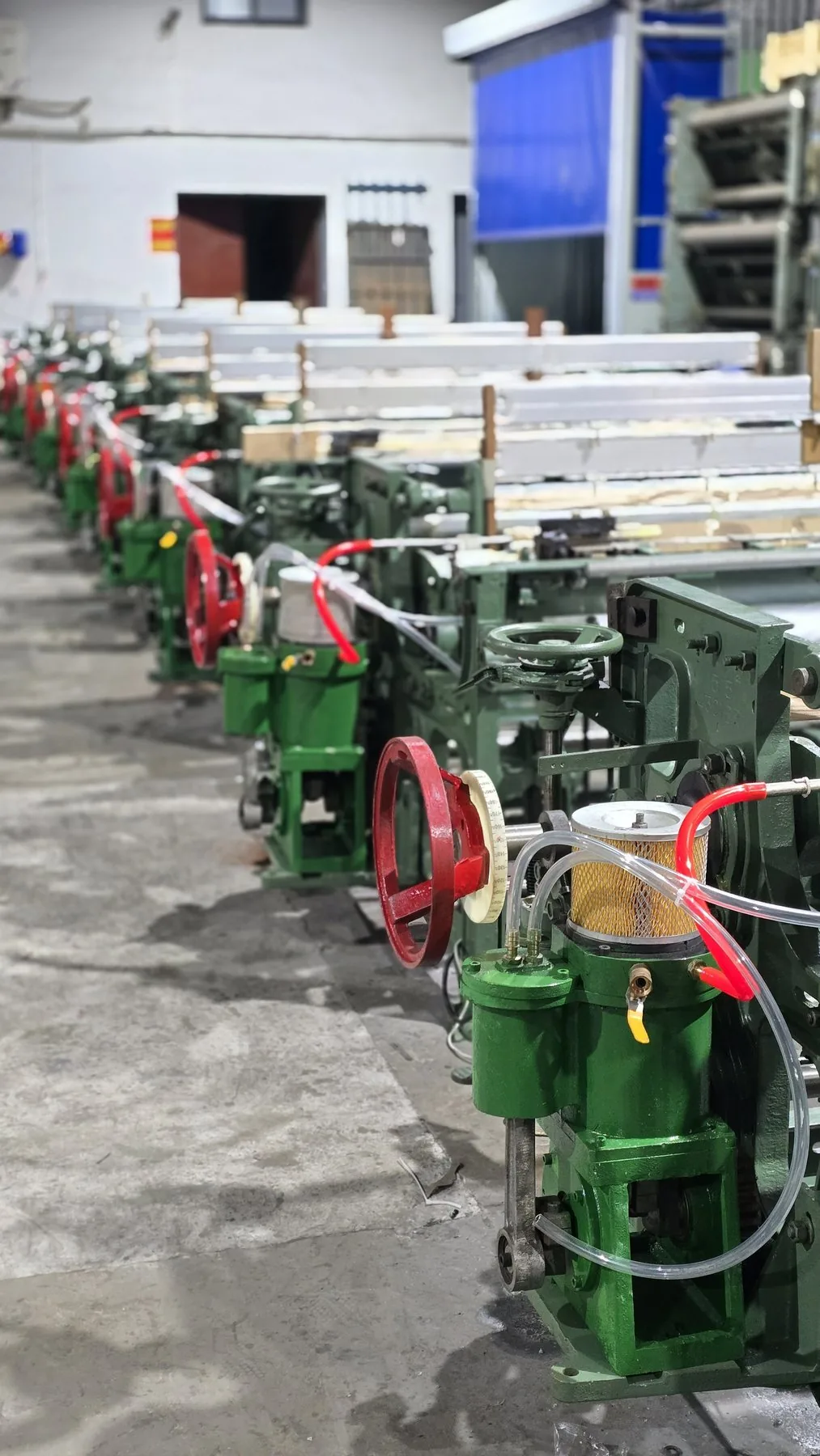 Side view of MG768 machines in production workshop